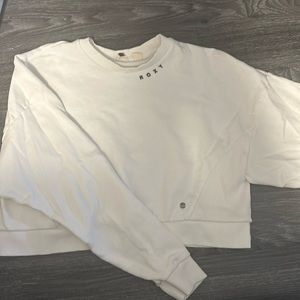 ROXY CROPPED SWEATER size large never worn . No stains